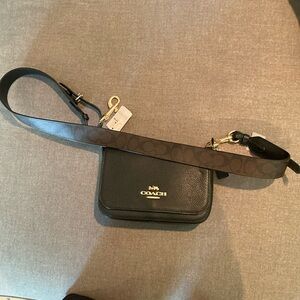 NWT Black Coach Messenger Black pebble leather with signature dark brown strap.